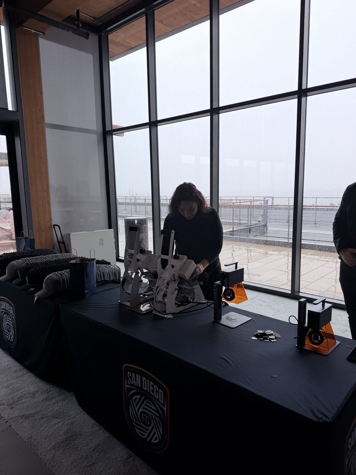 Merch Troop live printing — fresh prints off the platen